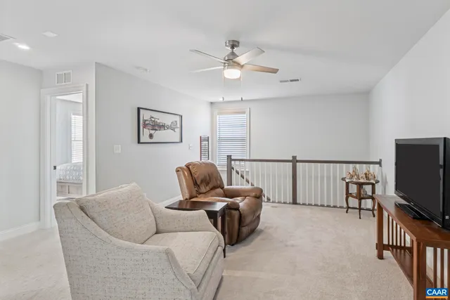 a bathroom with a sink a lamp and a mirror