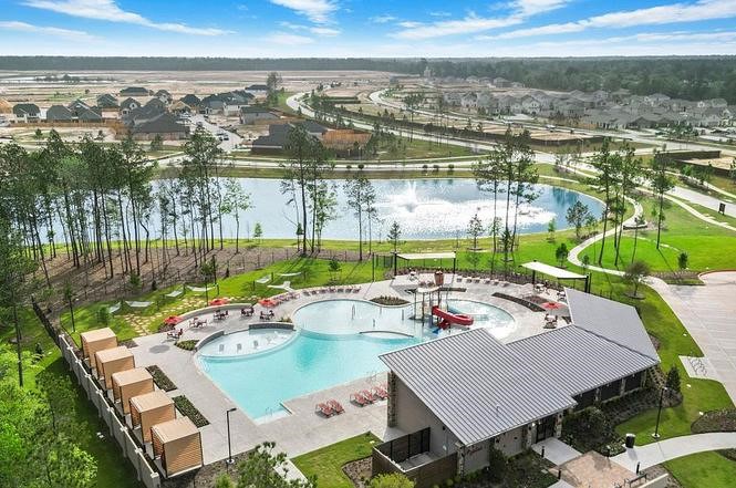 16193 Sepia Manor Street Conroe, TX 77302 - Photo 11 of 19 a view of a city from a balcony