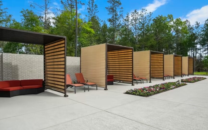 16193 Sepia Manor Street Conroe, TX 77302 - Photo 15 of 19 a view of backyard with barbeque grill and wooden fence