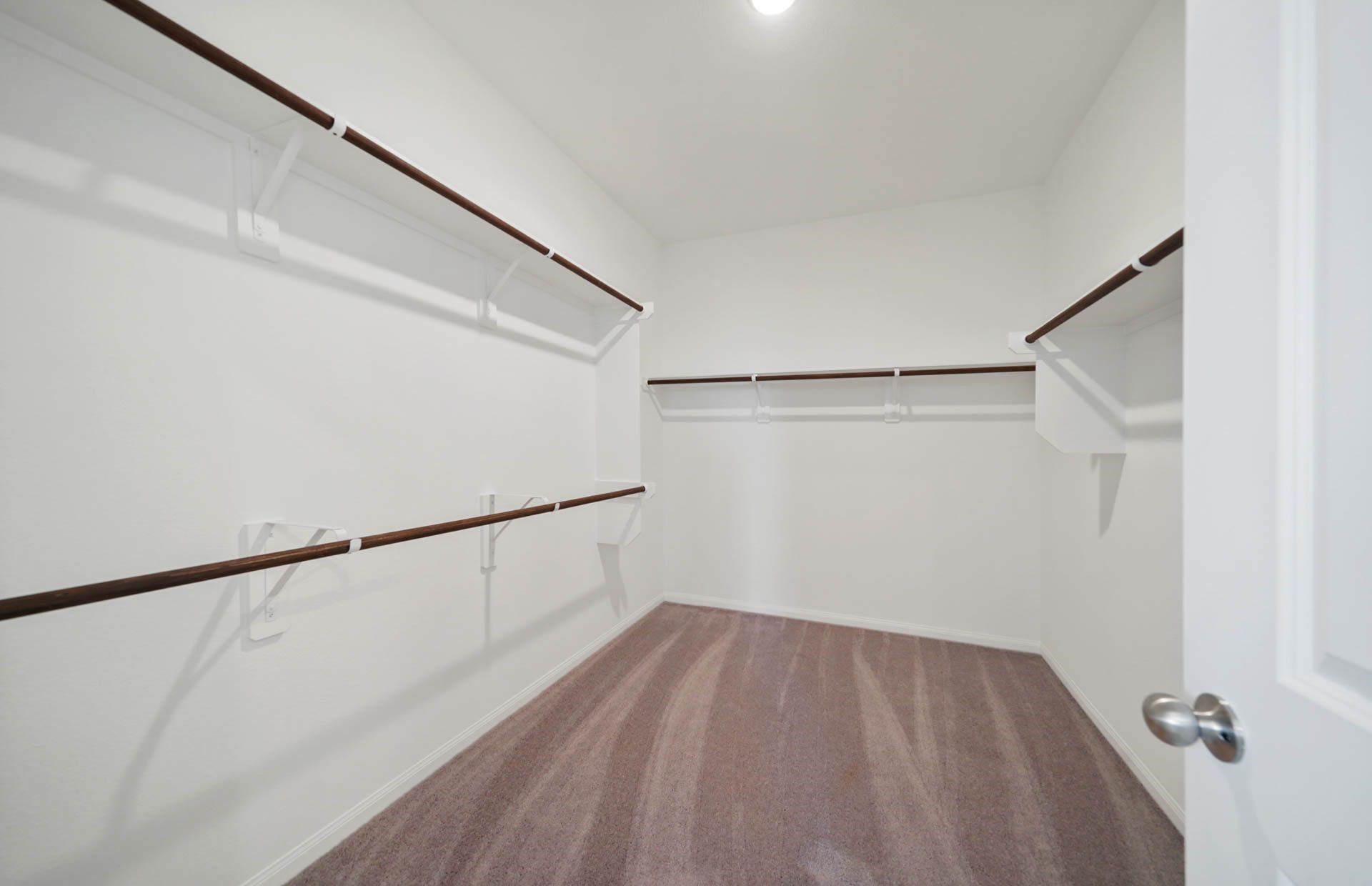 16193 Sepia Manor Street Conroe, TX 77302 - Photo 6 of 19 a view of small space with racks on the wall