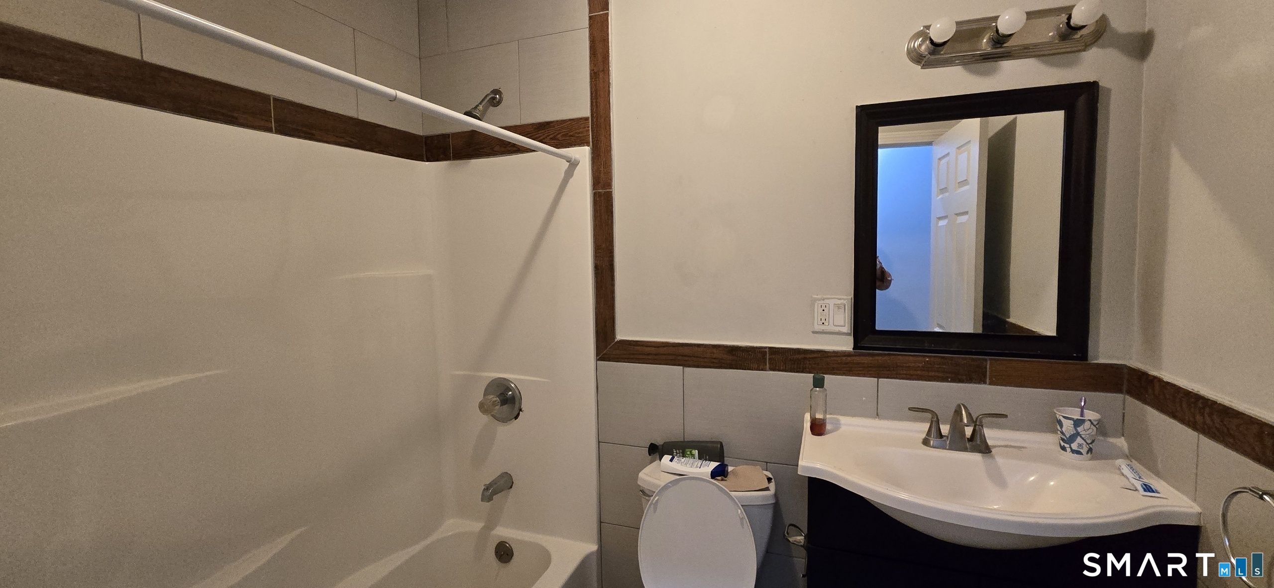 166 Affleck Street Hartford, CT 06106 - Photo 12 of 21 a bathroom with a sink a toilet and shower