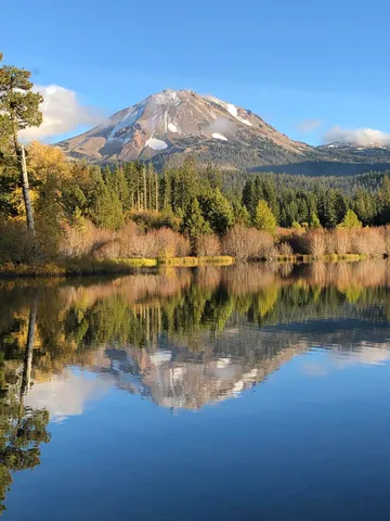 a view of a lake with a mountain in the background