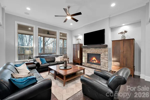 a kitchen with a counter top space a sink stainless steel appliances and cabinets