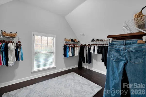 a kitchen with a black white checkered floor