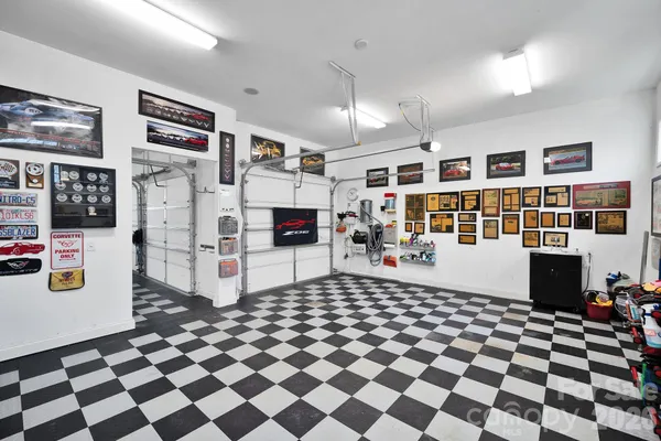 a view of bench sitting in backyard of house