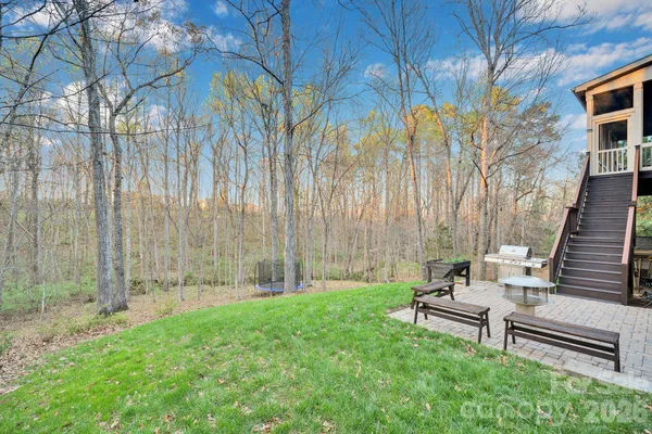 a view of a brick house with a large windows
