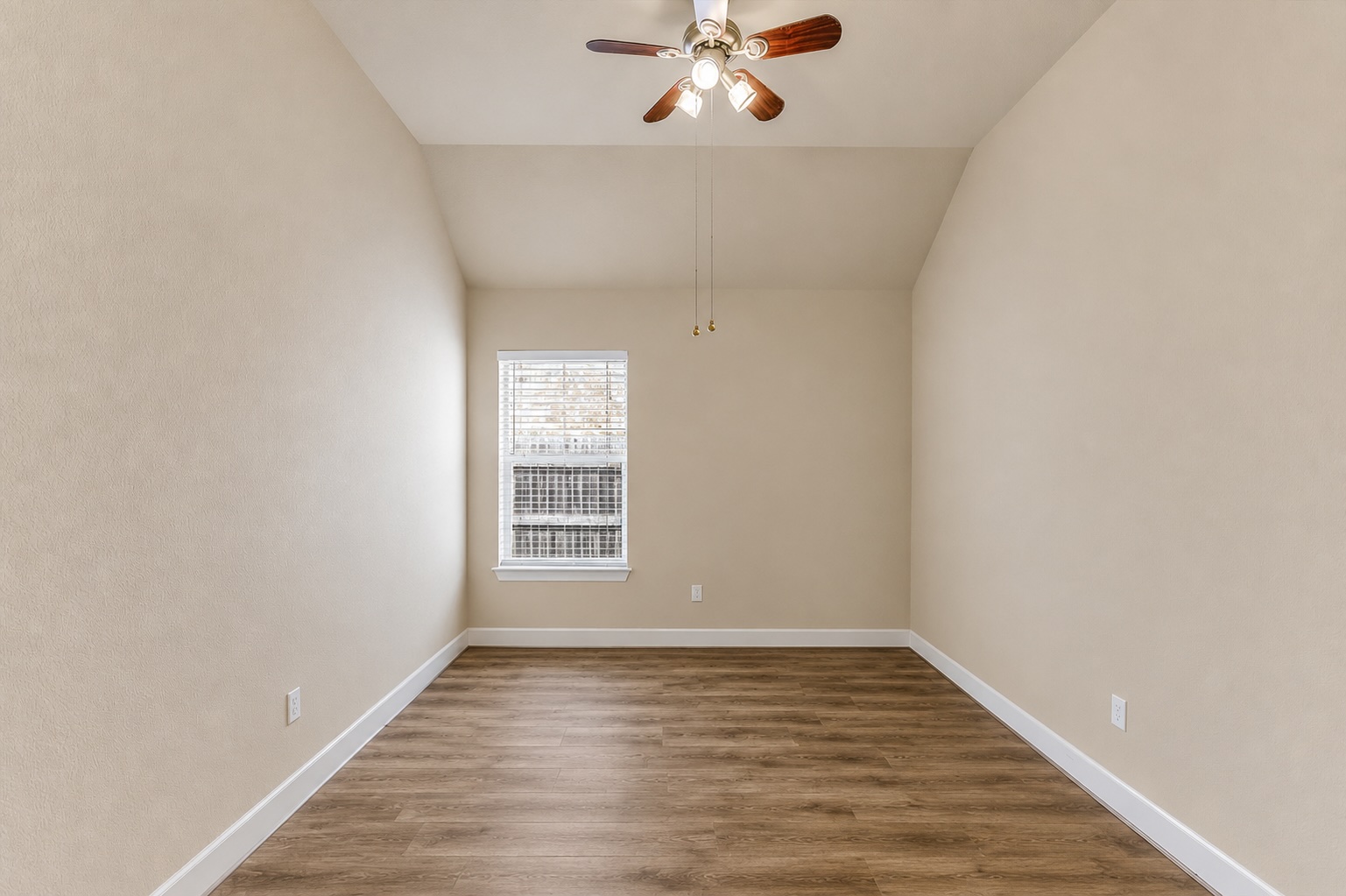 203 Gaspar Bend Cedar Park, TX 78613 - Photo 16 of 20 wooden floor in an empty room with a window