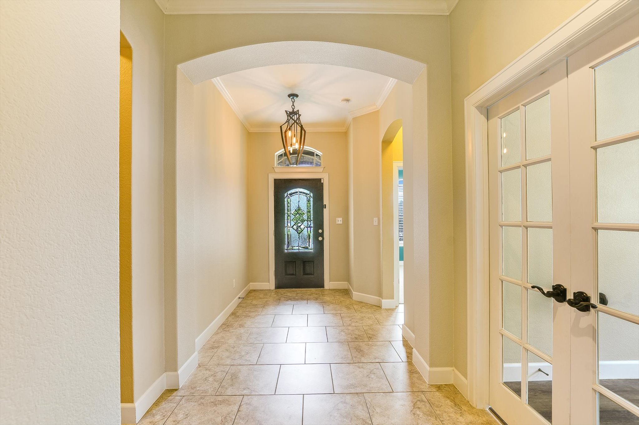 203 Gaspar Bend Cedar Park, TX 78613 - Photo 8 of 20 a view of a hallway with a wooden door