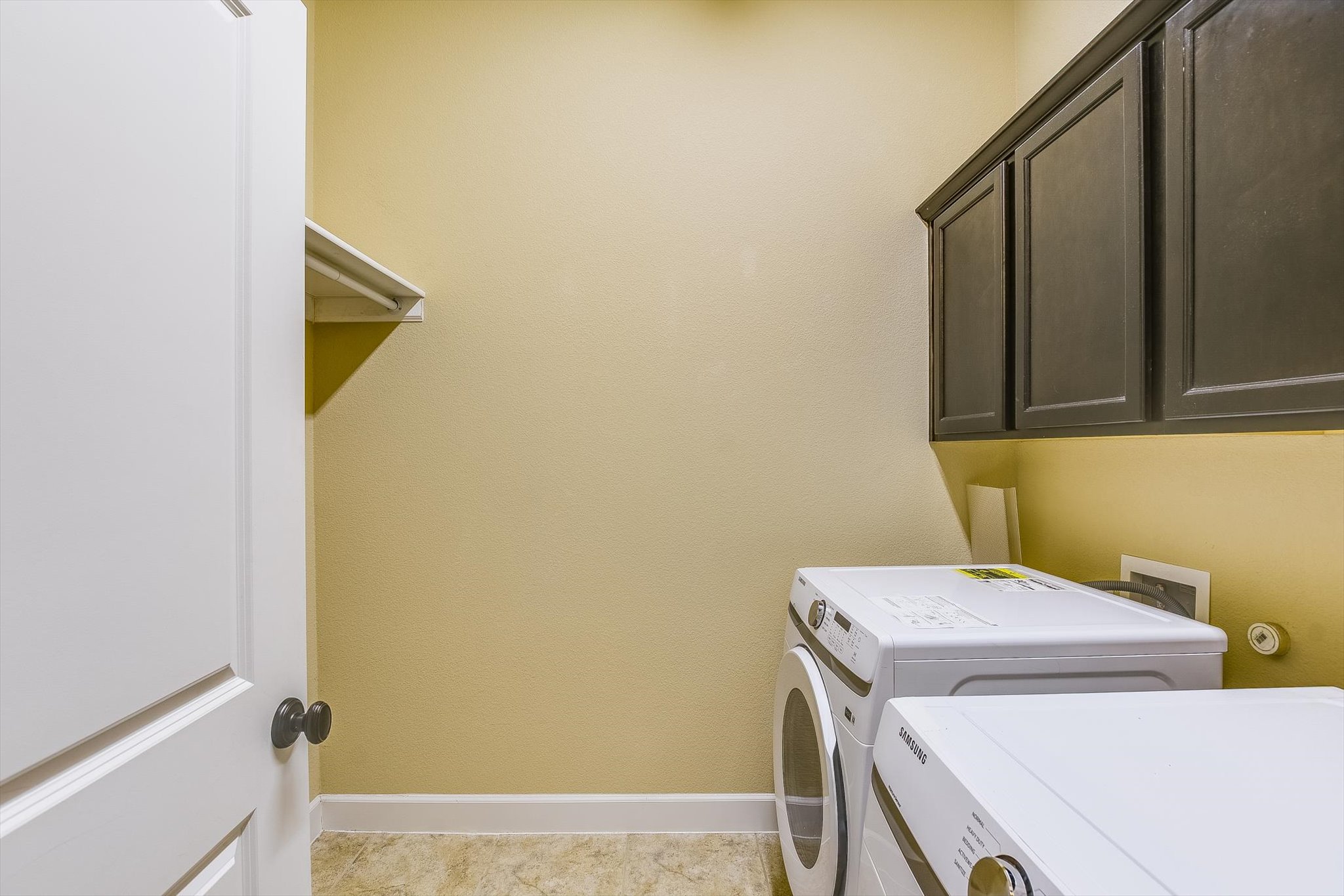203 Gaspar Bend Cedar Park, TX 78613 - Photo 10 of 20 a utility room with dryer and washer