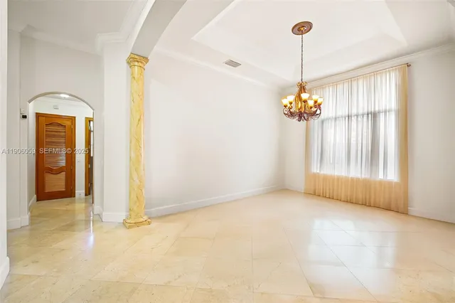 a large kitchen with stainless steel appliances granite countertop a stove and a sink