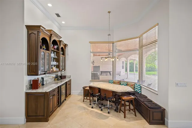 a spacious bathroom with a double vanity sink a large mirror and a bathtub
