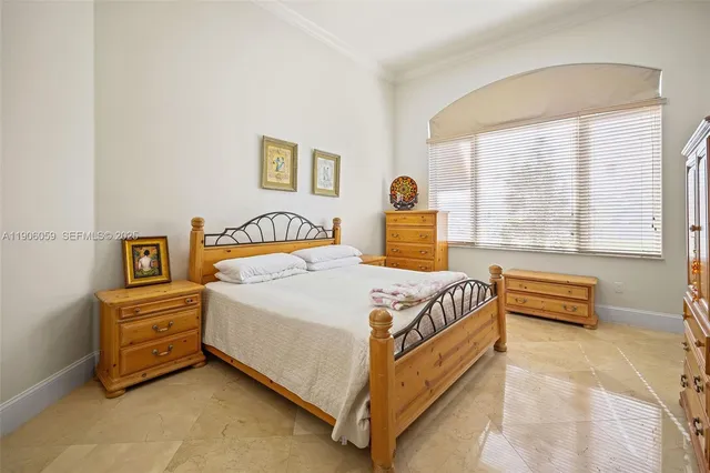 a view of a house with swimming pool and sitting area