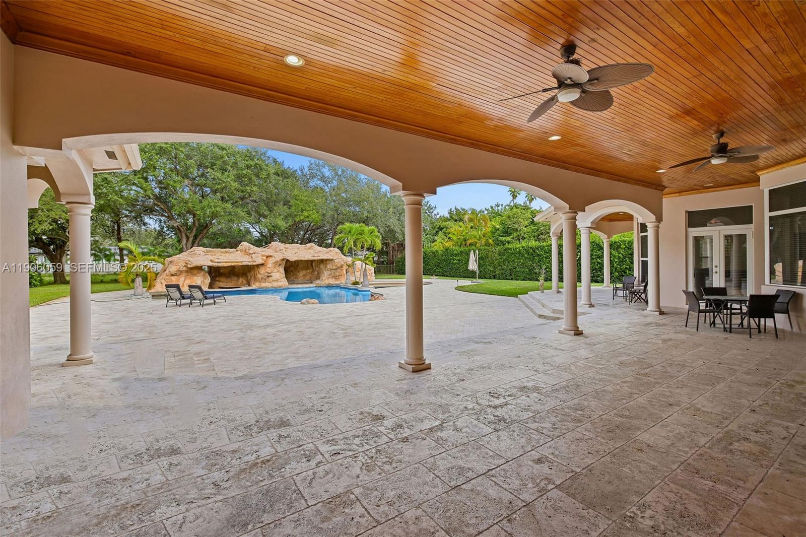 12175 Southwest 80th Street Miami, FL 33183 - Photo 37 of 61 a view of a house with porch and a yard