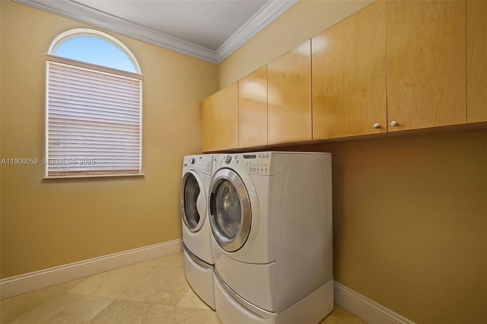12175 Southwest 80th Street Miami, FL 33183 - Photo 52 of 61 a utility room with dryer and washer