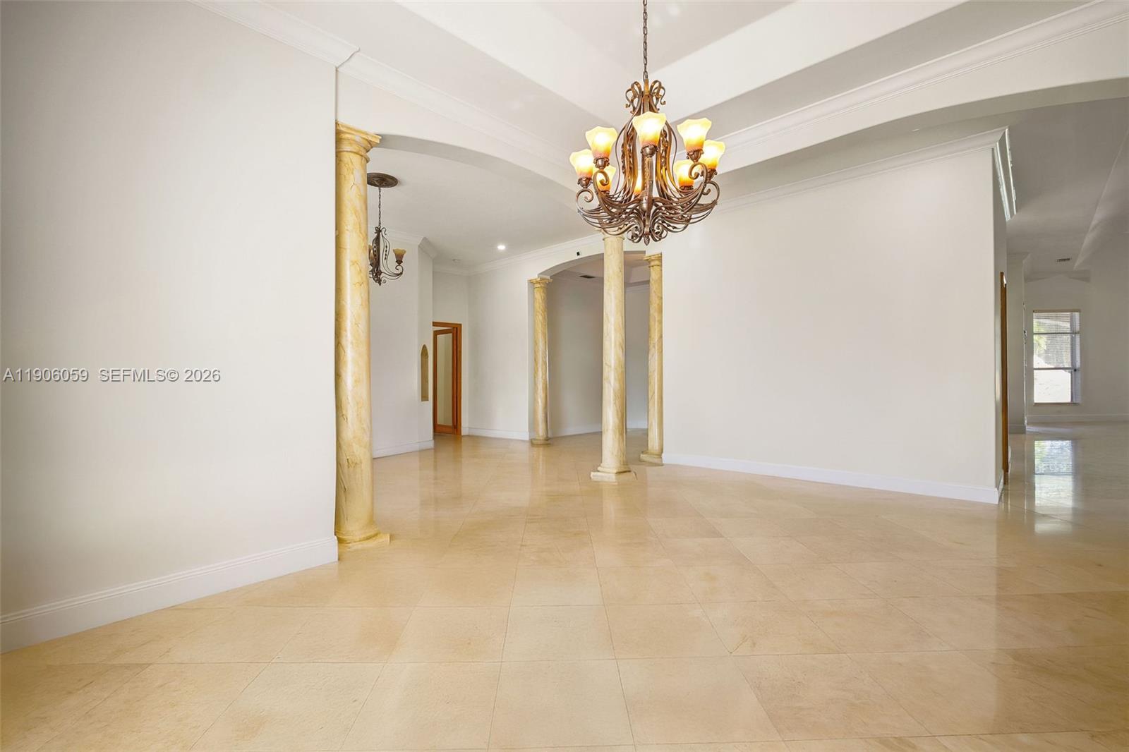 12175 Southwest 80th Street Miami, FL 33183 - Photo 9 of 56 a view of a chandelier in a room
