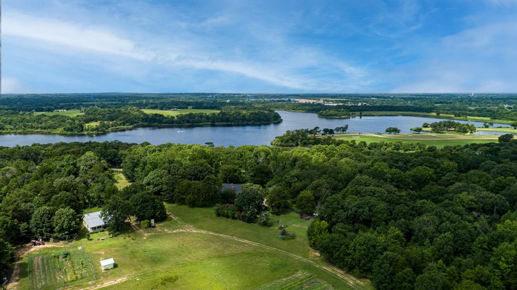 875 Arnold Paul Road Canton, TX 75103 - Photo 29 of 32 a view of a lake with a yard