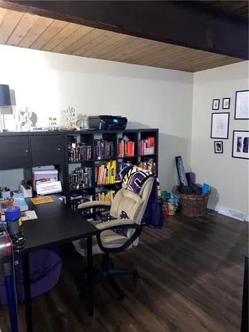 a view of a workspace with furniture