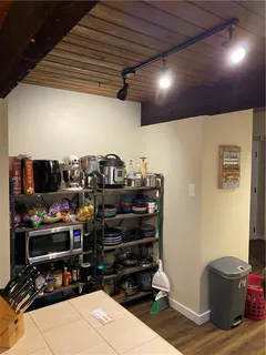 a room with furniture and a flat screen tv