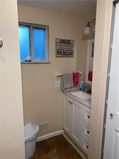 a bathroom with a toilet and a sink