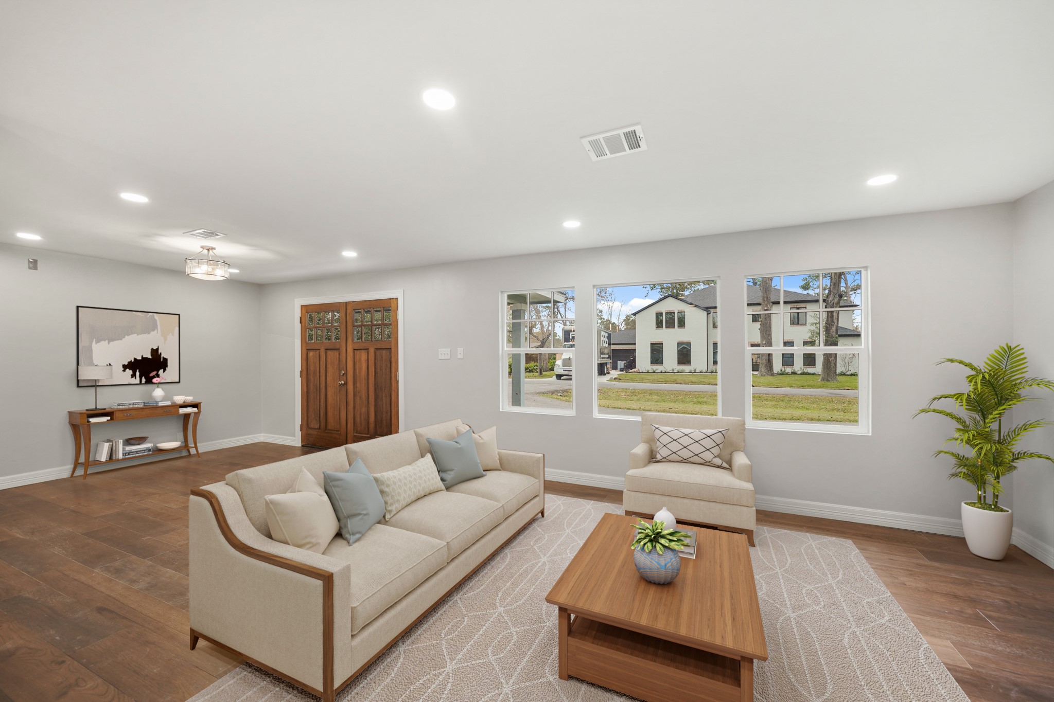 9313 Livernois Road Houston, TX 77080 - Photo 7 of 39 Virtually Staged: This home will greet you with beautiful natural lighting,engineered wood floors, and a fantastic view of the front yard.