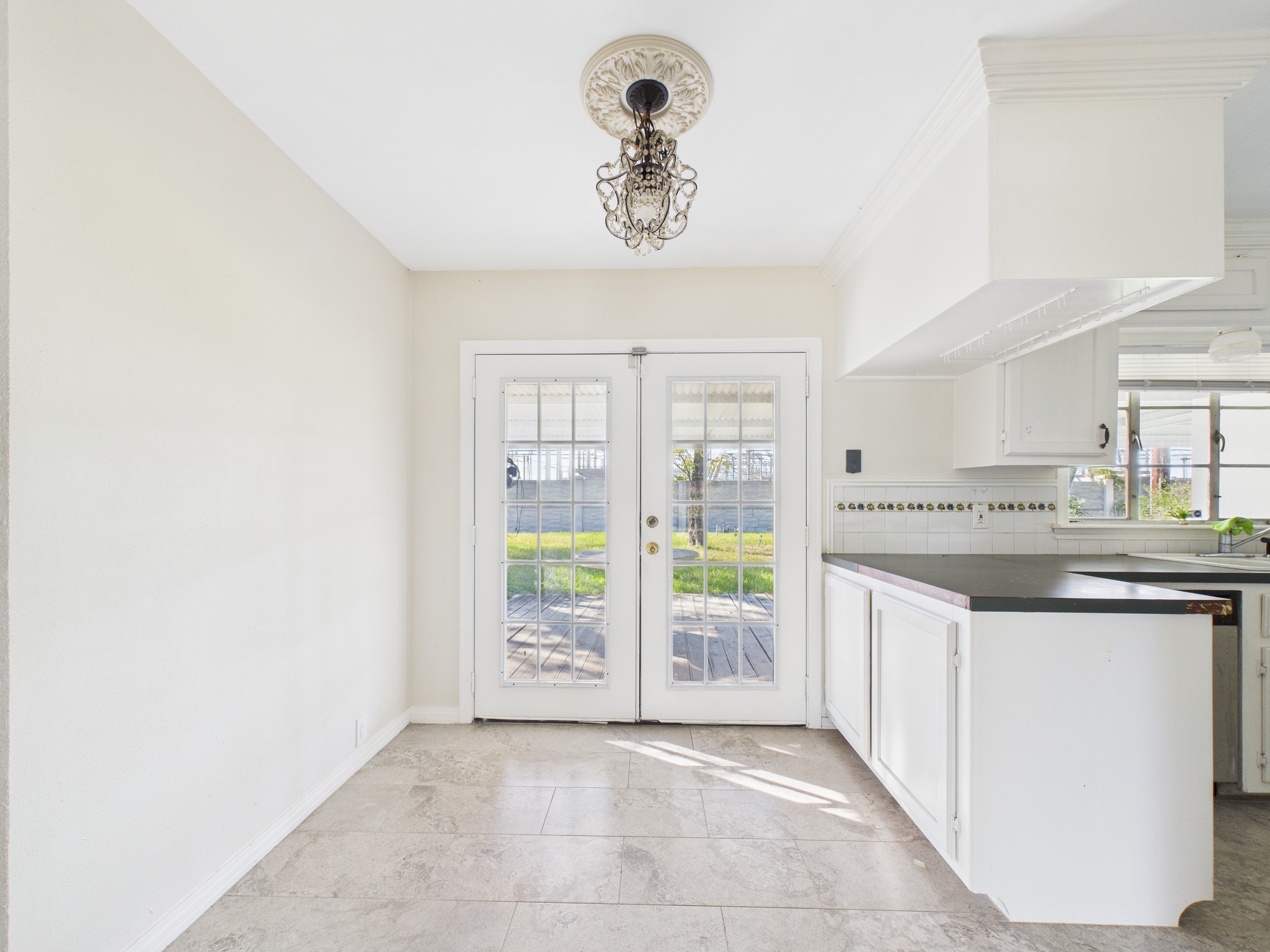 3035 Guese Road Houston, TX 77018 - Photo 6 of 20 a bathroom with a granite countertop sink and a mirror
