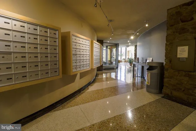 a lobby with furniture and window