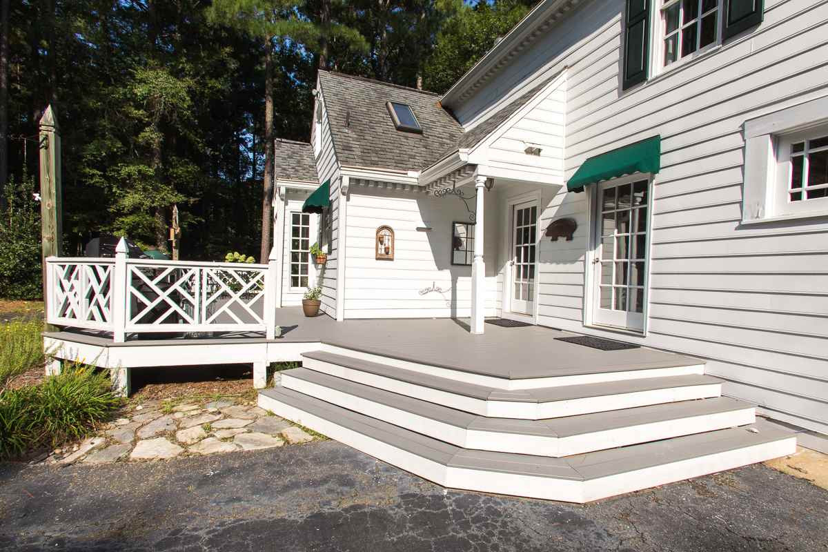 1715 Six Gables Road Durham, NC 27712 - Photo 22 of 25 There's plenty of space on the deck to entertain lots of friends. The deck surface is made of long-lasting composite boards (think Trex as one brand) which means you won't be spending your weekend re-staining the deck. Sorry. Deck