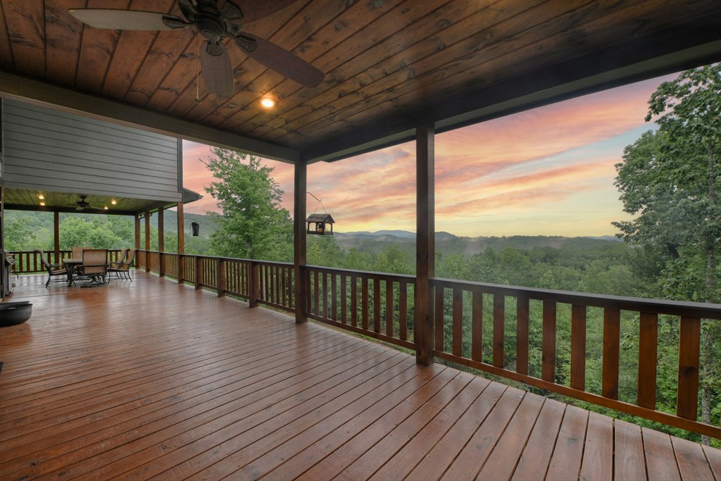 785 Wehunt Road Epworth, GA 30541 - Photo 16 of 73 a view of a balcony with wooden floor