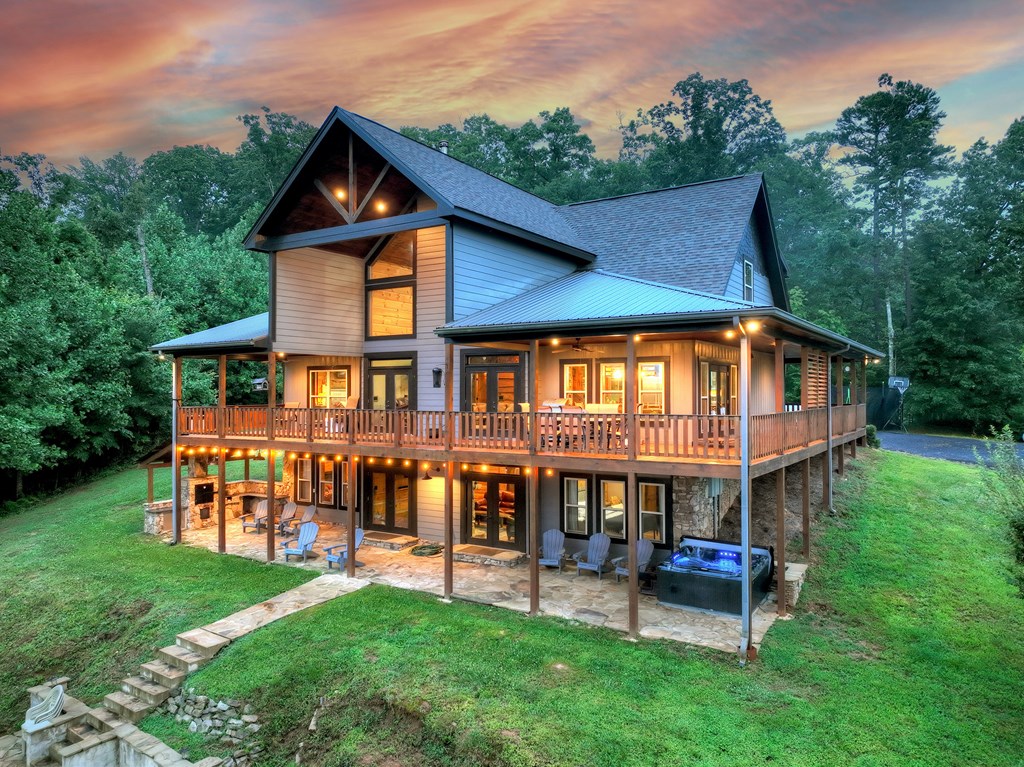 785 Wehunt Road Epworth, GA 30541 - Photo 2 of 73 a view of a house with a yard and deck