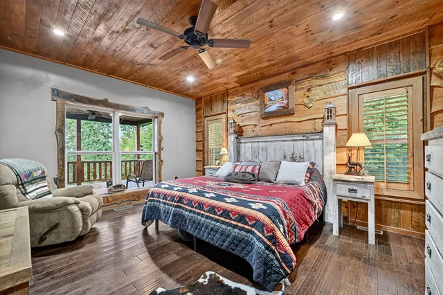 a view of a porch with wooden floor
