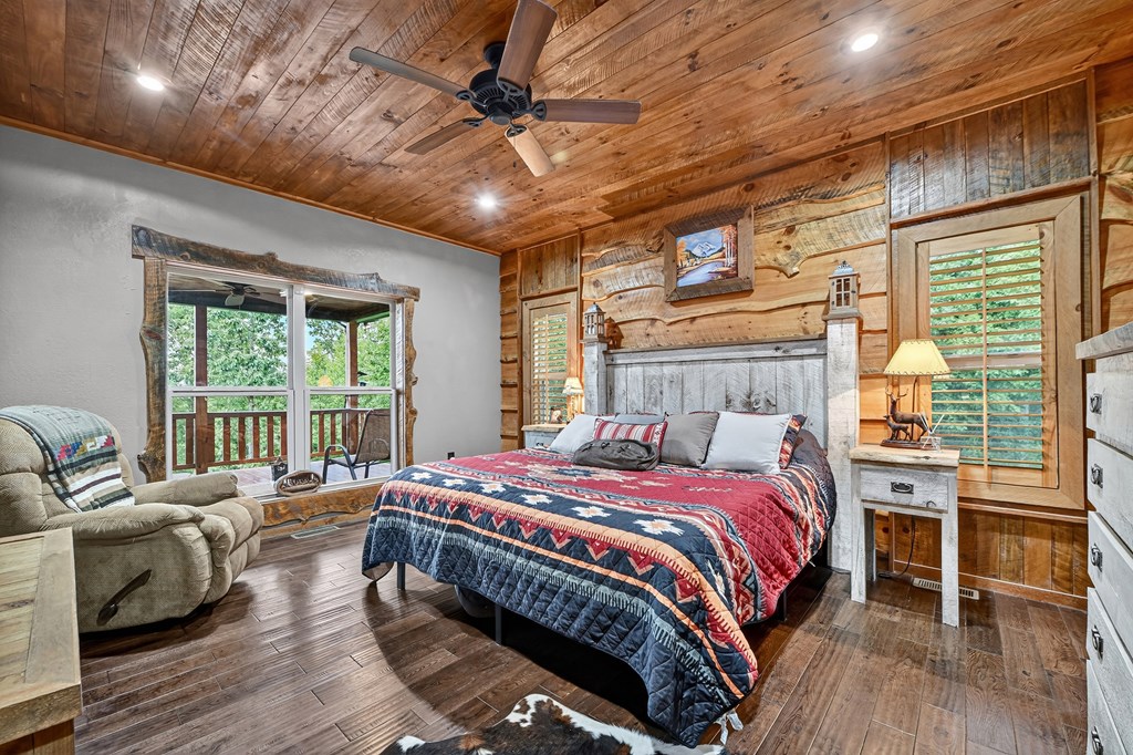 785 Wehunt Road Epworth, GA 30541 - Photo 22 of 73 a bed room with a bed and a chair