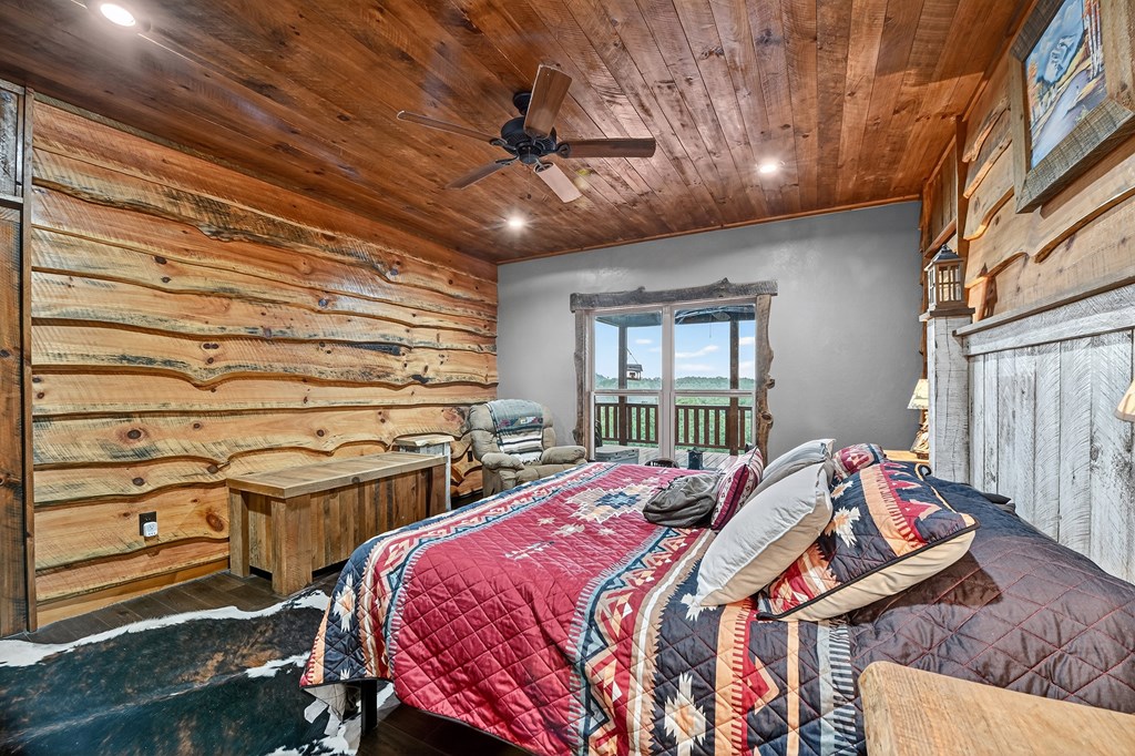 785 Wehunt Road Epworth, GA 30541 - Photo 23 of 73 a bed sitting in a bedroom next to a window