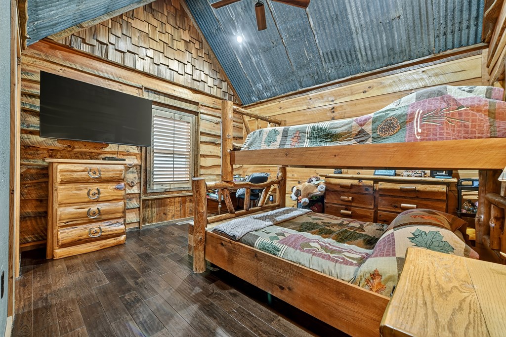 785 Wehunt Road Epworth, GA 30541 - Photo 30 of 73 a bed sitting in a bedroom next to a window