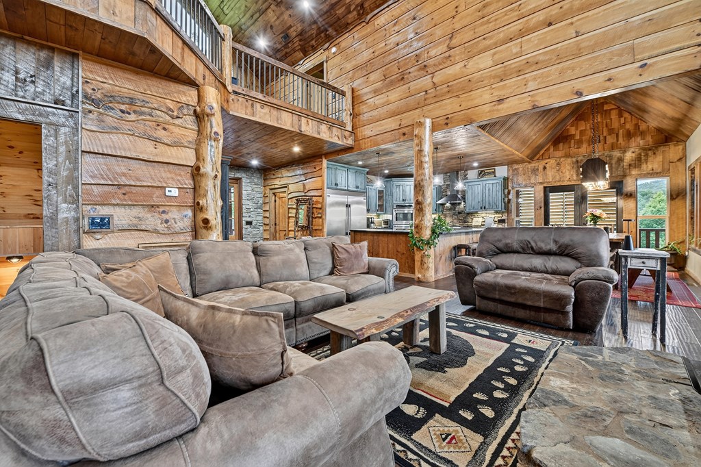 785 Wehunt Road Epworth, GA 30541 - Photo 9 of 73 a living room with furniture a large window and a rug