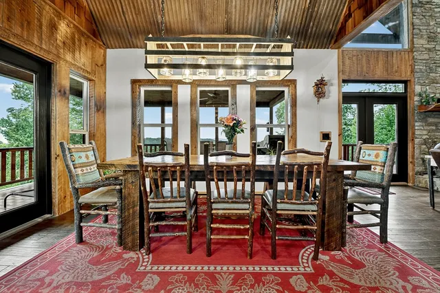 a kitchen with lots of counter top space and wooden floor
