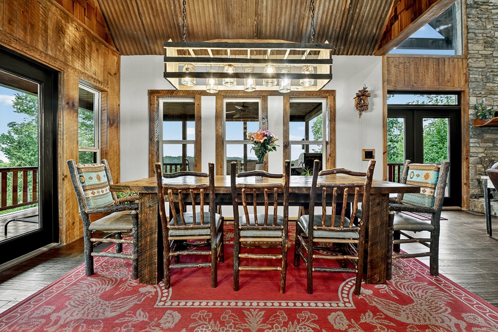 785 Wehunt Road Epworth, GA 30541 - Photo 10 of 73 a view of a dining room with furniture window and wooden floor