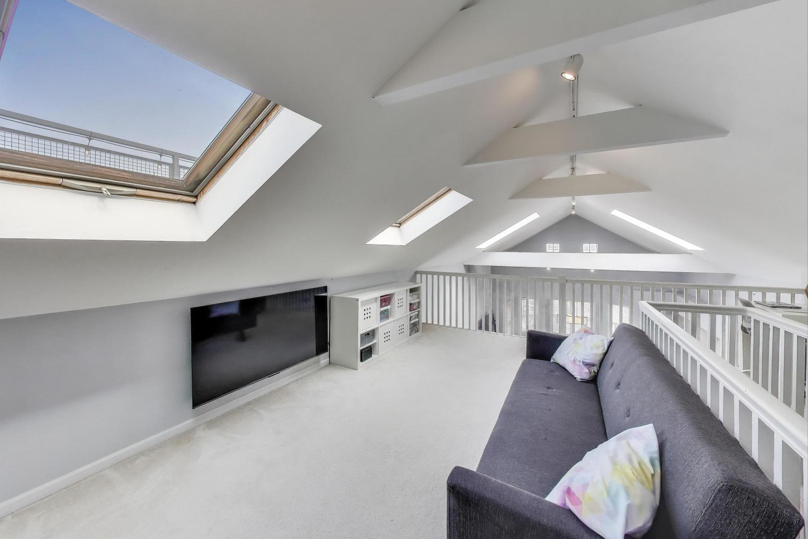 1862 North Halsted Street, Unit 3N Chicago, IL 60614 - Photo 10 of 25 a living room with furniture and a fireplace