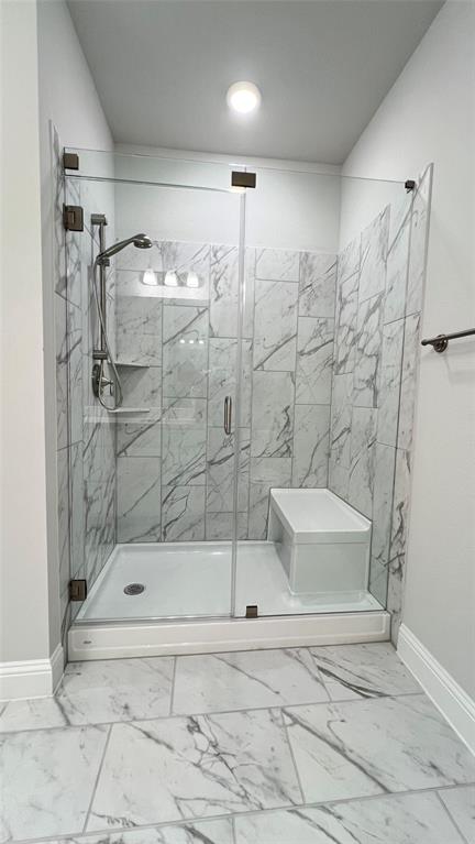 651 Watters Road, Unit 3300 Allen, TX 75013 - Photo 17 of 25 Bathroom featuring a shower with shower door
