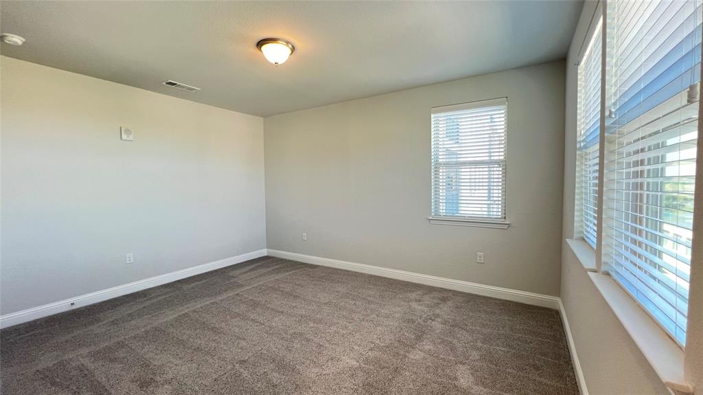 651 Watters Road, Unit 3300 Allen, TX 75013 - Photo 21 of 25 View of carpeted empty room