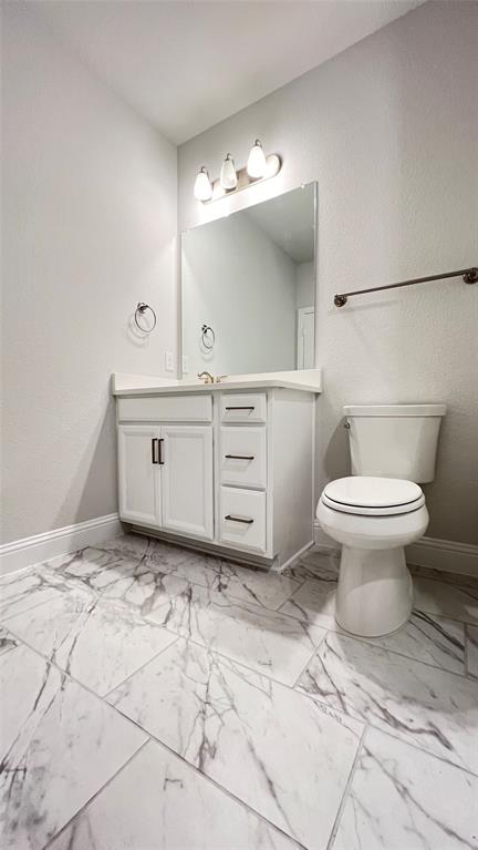 651 Watters Road, Unit 3300 Allen, TX 75013 - Photo 22 of 25 Bathroom featuring vanity and toilet