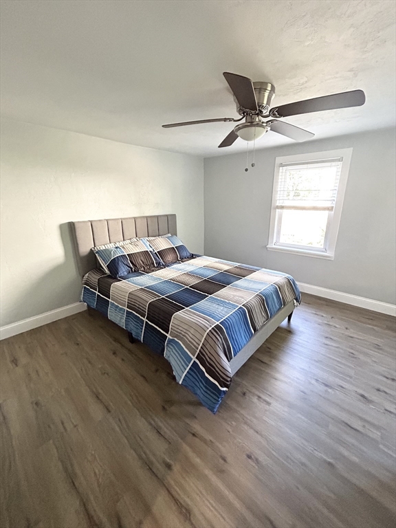 13 Maranook Road Worcester, MA 01606 - Photo 12 of 24 a bedroom with a bed and wooden floor