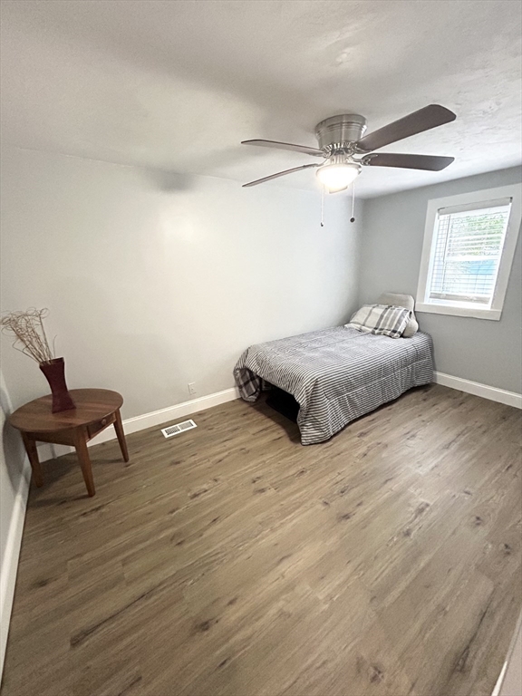 13 Maranook Road Worcester, MA 01606 - Photo 14 of 24 a spacious bedroom with a bed and a chair
