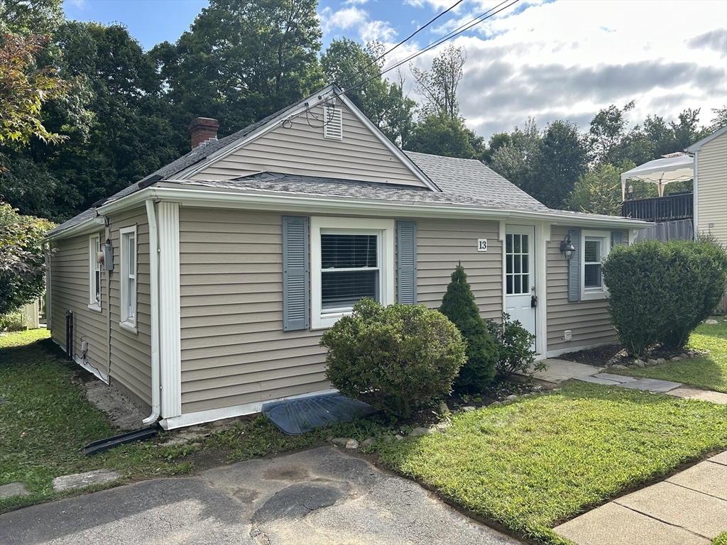 13 Maranook Road Worcester, MA 01606 - Photo 3 of 24 a front view of a house with garden