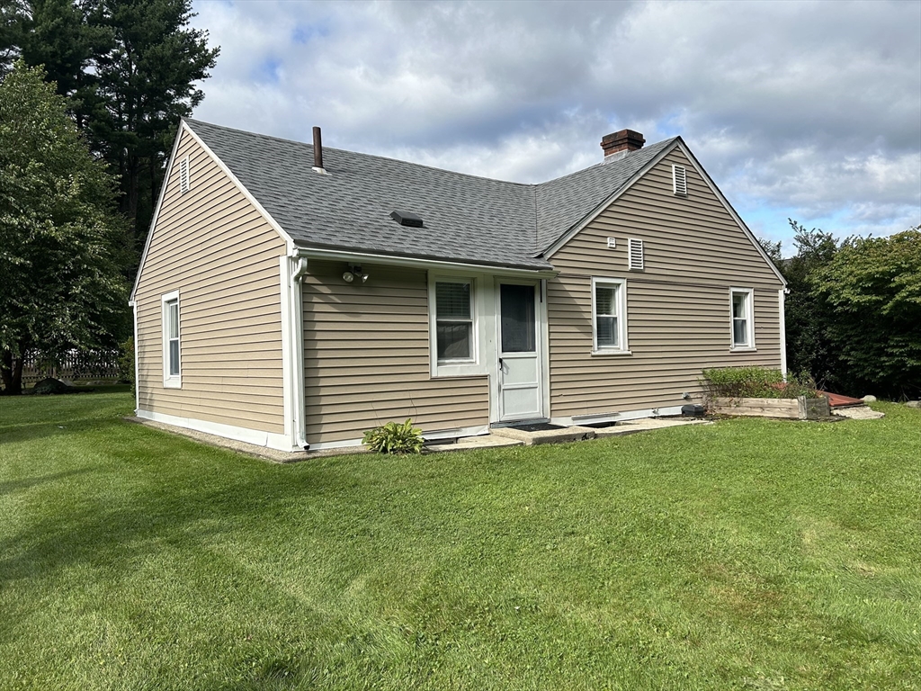13 Maranook Road Worcester, MA 01606 - Photo 6 of 24 a front view of a house with a yard
