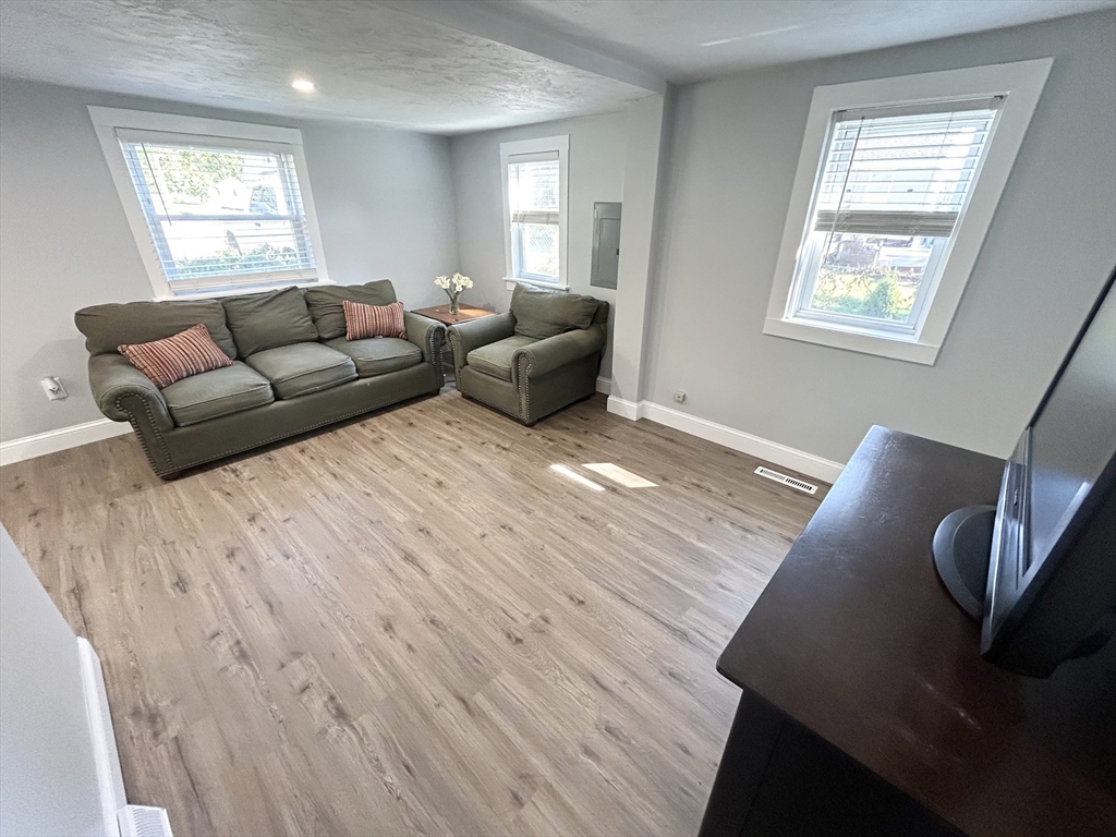 13 Maranook Road Worcester, MA 01606 - Photo 8 of 24 a living room with furniture and a window