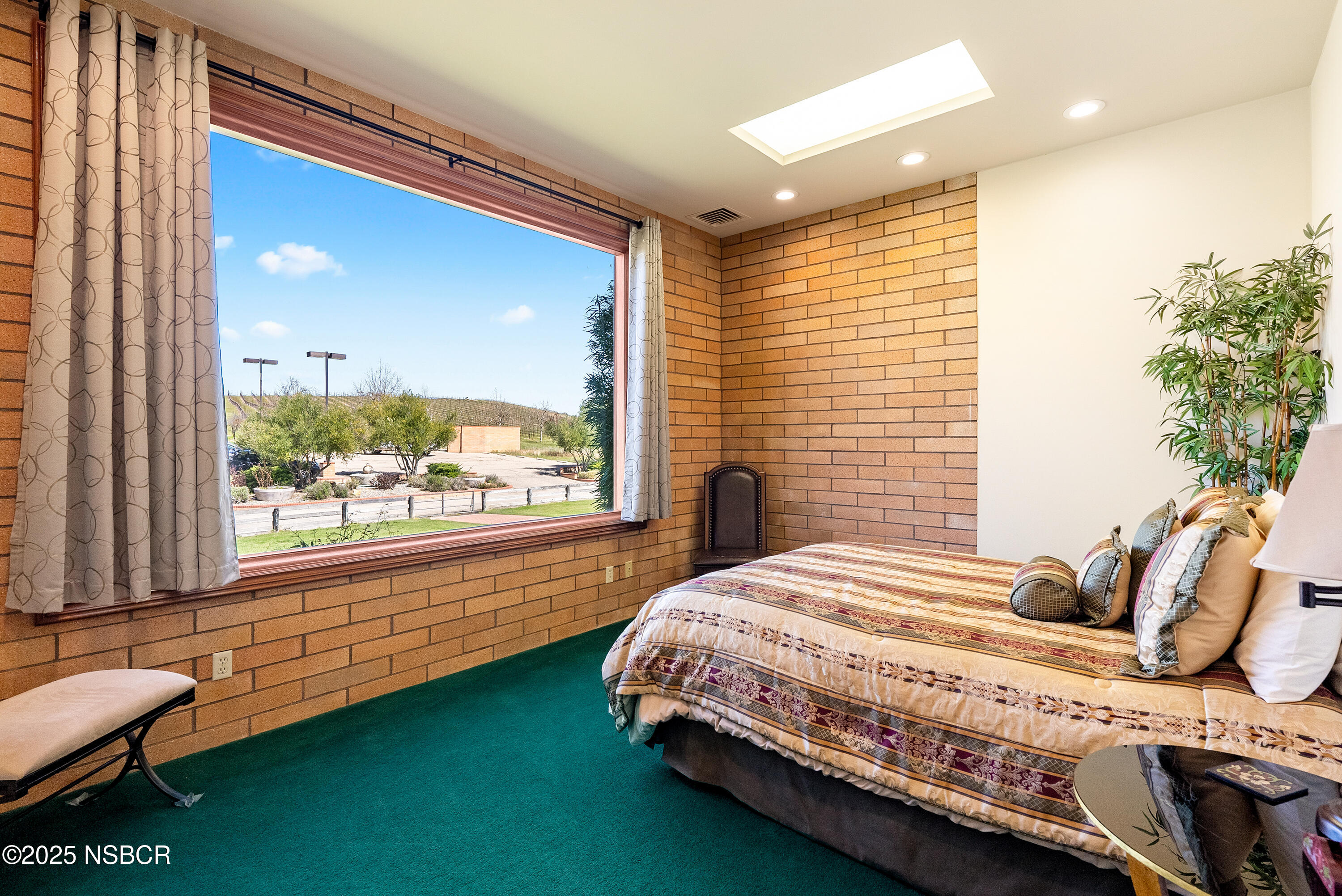 5010 Gate 4 Road Paso Robles, CA 93446 - Photo 16 of 57 a bedroom with a bed and a window