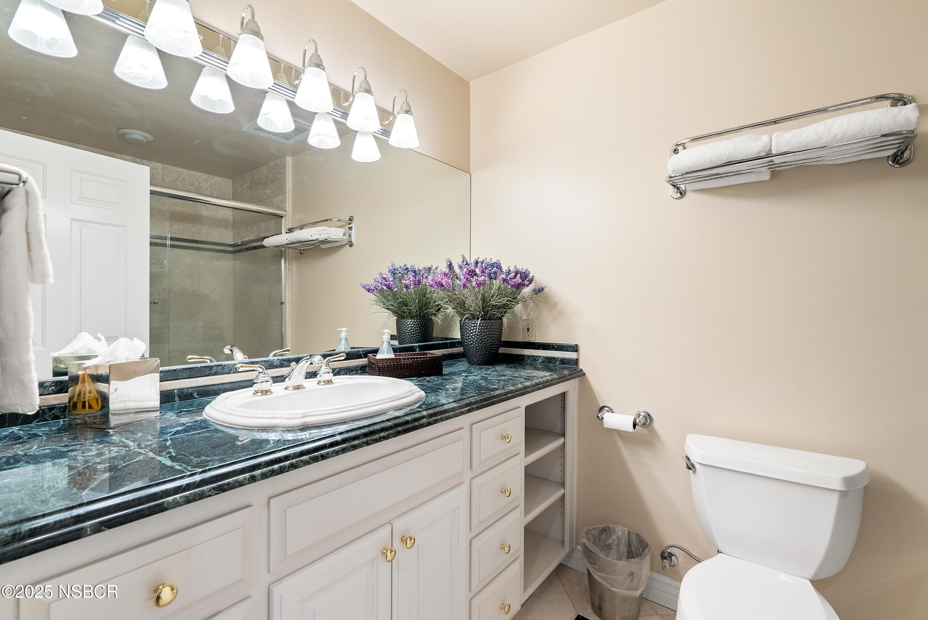 5010 Gate 4 Road Paso Robles, CA 93446 - Photo 29 of 57 a bathroom with a granite countertop sink mirror and toilet