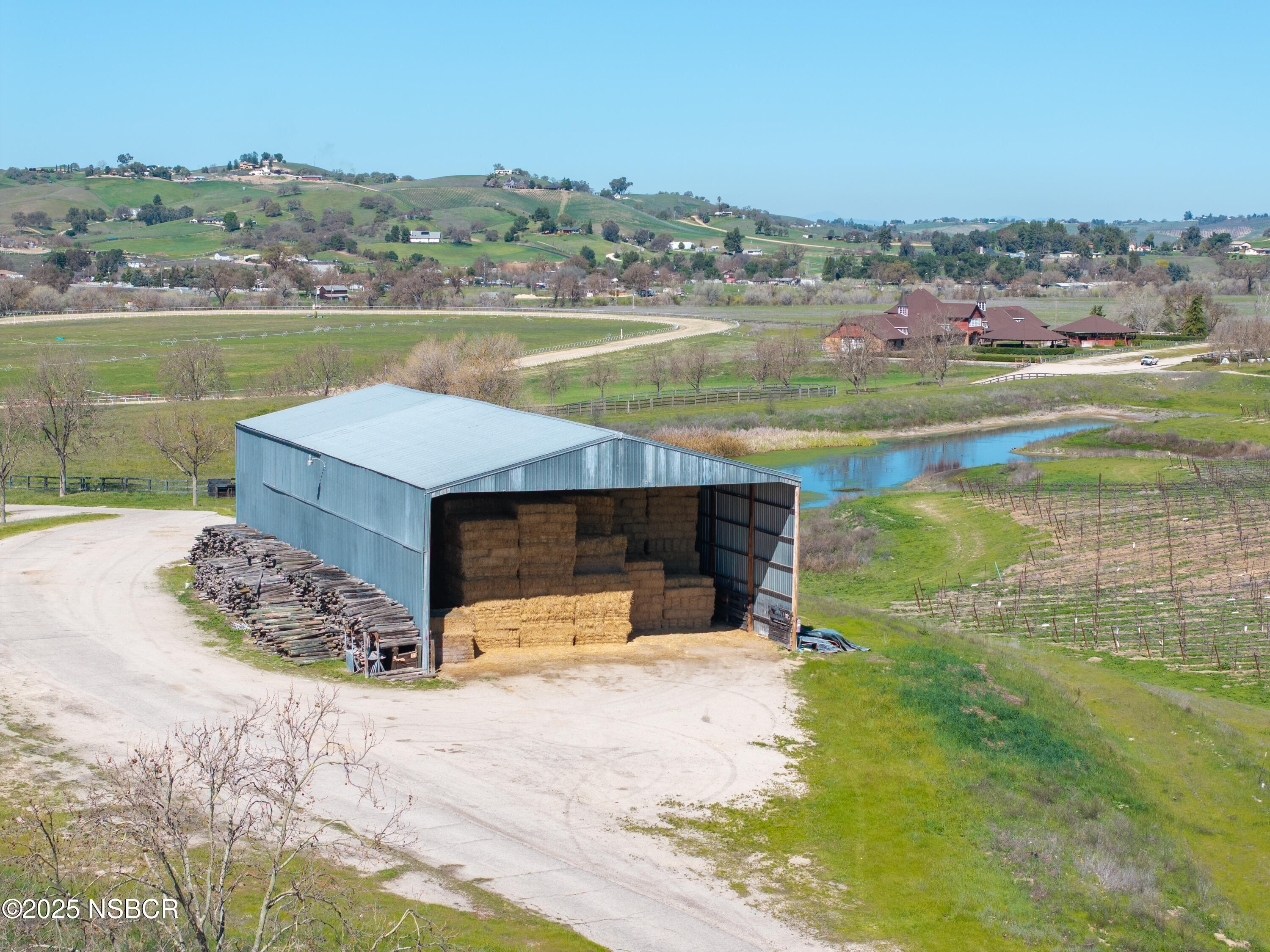 5010 Gate 4 Road Paso Robles, CA 93446 - Photo 45 of 57 an aerial view of a house with a yard and lake view