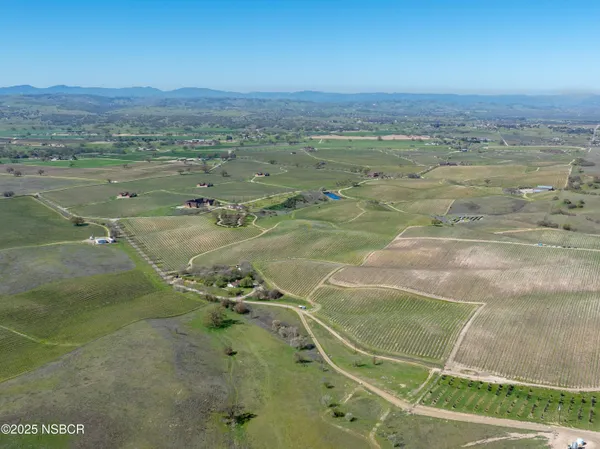 a view of swimming pool with seating area