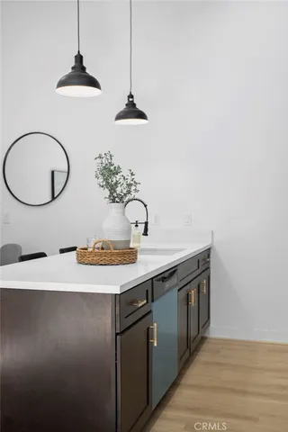 a living room with furniture and white wall